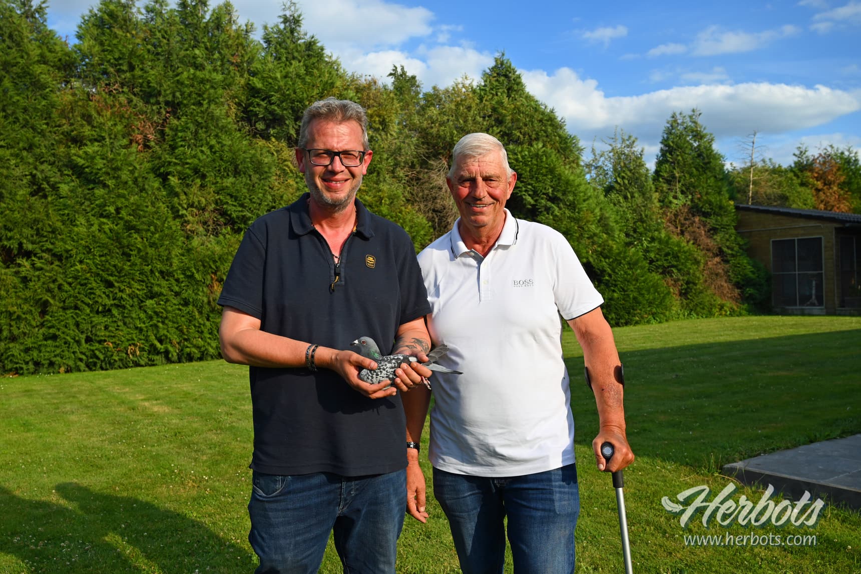 Clabots père et fils - Grâce Hollogne: 1e Nationaal Limoges 6.972 oude- snelste van 16.063 duiven.